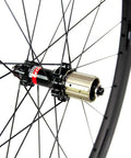 Close-up of the dual Novatec straight pull hub on a Beefy 50mm Deep Carbon Wheelset Tubeless Ready with Basalt Braking Surface.
