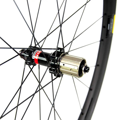 Close-up of the dual Novatec straight pull hub on a Beefy 50mm Deep Carbon Wheelset Tubeless Ready with Basalt Braking Surface.