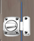 Close-up of a Sliding Door Lock Zinc Alloy Universal Wardrobe Catch Bolt Gate Latch on wooden door surface.