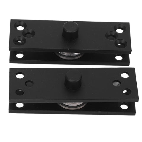 Pair of black hidden door hinge plates with central pivot rollers