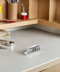 Upgrade Your Boat With These Sleek Stainless Steel Door Catches Perfect For Yacht Cabin Doors on a desk with office supplies.