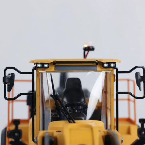 Badass 1/16 Scale RC Loader Built Like A Tank With Killer Four Wheel Drive And Heavy Duty Transmission front view showing cockpit and controls.