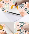 Hand peeling back Dead Simple Peel And Stick Wallpaper Pink Safari Jungle Zoo Design Self Adhesive Vinyl Roll for easy application.