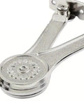 Close-up of silver hinge from 2 Pack Heavy Duty Toy Box Hinges With Soft Close Lid Support Beefed Up 50 Lb Capacity Easy Install Quiet Smooth Operation Ideal For Toy Chests Storage Boxes And DIY Furniture Projects, showing floral design detail.