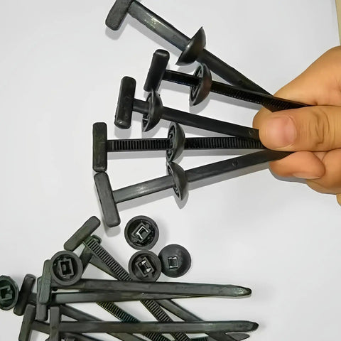 Hand holding 30 Pack Heavy Duty Self Locking Nylon Cable Ties Zip Ties With UV Resistant Buckles for car bumpers and home projects.