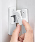 White 90 Degree Barn Door Lock With Right Angle Slide Latch For Sliding Wood Panels in use on a wooden door.