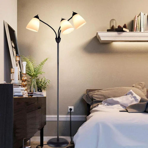 Cozy bedroom scene with Three Light Modern Reading Floor Lamp With Adjustable Gooseneck 360 Degree Omnidirectional Lighting.