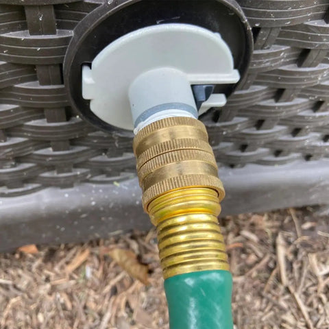 Close-up of Three Quarter Inch Female To Female Garden Hose Adapter Kit With Solid Brass Construction Swivel Connectors in use