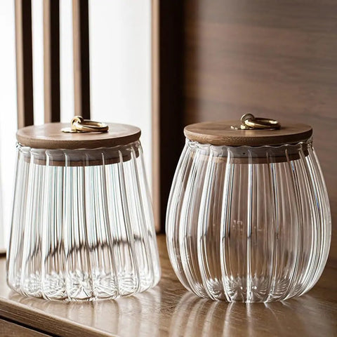 Score A Solid Straight Up Airtight Glass Tea Canister And Coffee Bean Storage Jar With Moisture Proof Seal To Keep Every Cup Fresh Built With Thick Clear Glass Perfect For Home Use Today - two glass jars with wooden lids on a table.