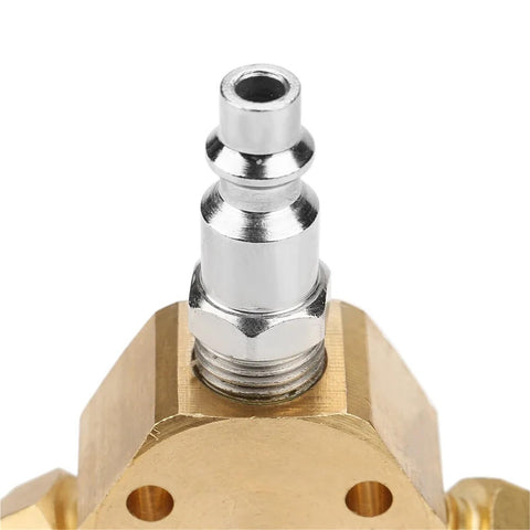 Close-up of a Three Way Air Manifold With Quick Connect Brass Body For Pneumatic Systems featuring a brass quick-connect port.