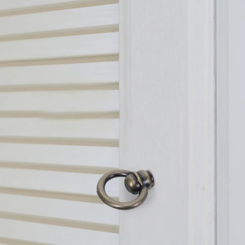 Side view of vintage bronze ring cabinet pull handle with screws on white louvered door for kitchen dresser cupboard furniture hardware retro metal ring knob for classic cabinets and timeless decor upgrade home improvement old school charm.