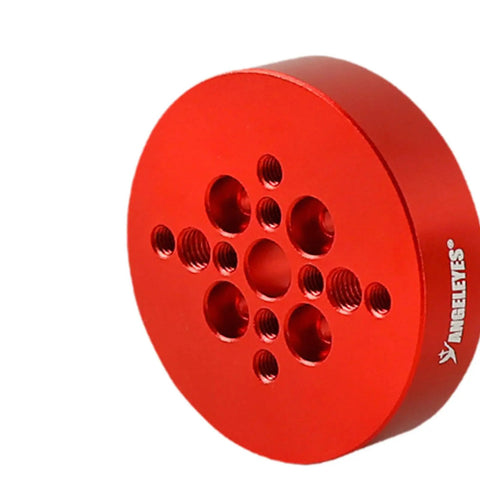 Red circular piece of the Beefy Telescope Mount Clamp Dovetail Saddle Adapter Metal Plate For Secure Connection Universal Positioning Part