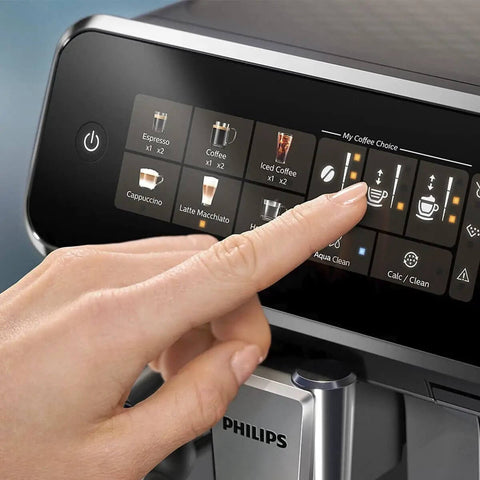 Touching the display of a Fully Automatic Espresso Machine With LatteGo Milk System For Pro Grade Silky Froth And 5 Coffee Varieties Intuitive Touch Display SilentBrew 100 Percent Ceramic Grinder AquaClean Filter Glossy Black
