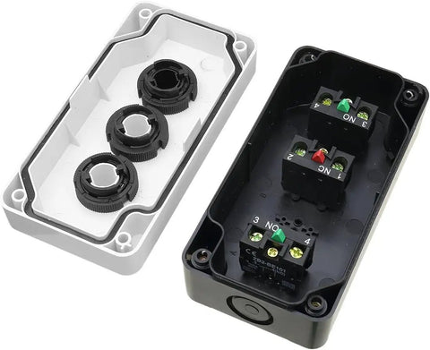 Interior view of 3 Button Industrial Control Station with up and down arrows center stop button built tough white and black housing