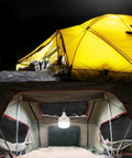 Yellow tent illuminated by Newest 30W 5500LM Waterproof Rechargeable LED Night Light Bulb inside, for camping use and power backup.