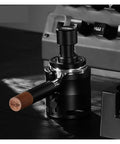 58mm Adjustable Portafilter Holder And Espresso Tamping Station with black finish and wood handle for secure coffee tamp.