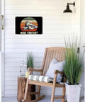 Who Tooted Steam Train Metal Sign Aluminum Wall Decor 8x12 Inches on white porch wall above a wooden chair