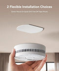 Hassle Free Smoke Detector Designed With Adaptive Sensing To Slash Nuisance Alerts While Delivering Dependable Household Fire Protection Runs Smooth On A Single Nine Volt Battery Offers Quick Easy Wall Install, shown in hand with 3M tape mount.