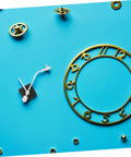 Vinyl Record Clock Mechanism Kit For DIY Projects Easy Install And Accurate Timekeeping with gears and clock face on blue background