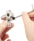 Close-up of Chinco BPV-31 piercing valve kit; stainless steel refrigerator valve with Allen wrench