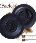 Front view: two black 54mm silicone Breville backflush discs for espresso machines.
