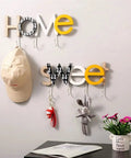 Rustic Wall Mounted Coat Hooks Solid Pine Wood Distressed Finish Super Tough Heavy Duty Multi Hook Rack For Coats Hats Keys Game Changer Bedroom Home Decor Organizer with decorative letters 'Home Sweet' and various items.
