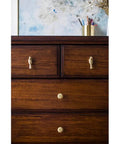 Dresser featuring Brass Bird Knob Door Handle for Cabinets and Drawers, adding a decorative accent, solid brass, oxidation resistant finish