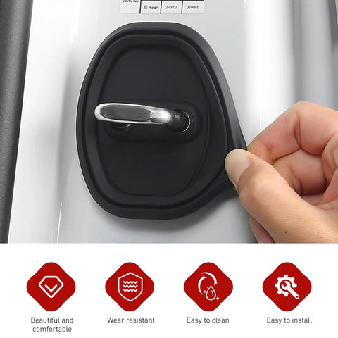 Close-up of a Set Of Four Rock Solid Silicone Door Latch Covers Anti Impact Bumper Pads on a car door latch.