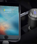 Dual USB Car Charger With Quick Charge 3.0, 2 USB Ports, In Car Carbon Monoxide Alarm With LCD Display, High Sensitivity CO Detector, Fast Charge Car Adapter For Safer Road Trips, Black, installed in car with phone.