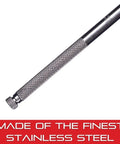Close-up of the knurled grip section of a small steel rule with holder, professional grade precision measuring tool.