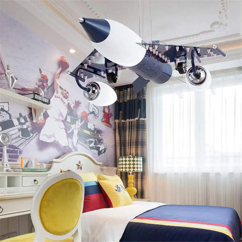 Airplane Shape Three Light Pendant For Kids Room in a bedroom, metal LED suspension with adjustable chain.