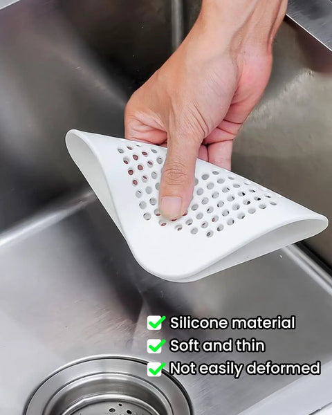 Heavy Duty Two Pack Square Hair Drain Catcher And Tub Filter With Grip Tight Suction Pads To Keep Your Shower Bathtub And Kitchen Sink Totally Clear Grey held above a kitchen sink.
