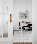 Antique Barn Door Handles And Vintage Sliding Door Handle Set In Rustic European Style installed on glass doors in dining room