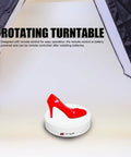 Depisuta 22cm Electric Rotating Turntable Display Stand With Led Colorful Light showcasing a red high heel shoe on a white platform.
