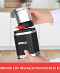 Electric Coffee Bean Grinder With Slick One Touch Operation And 180W Motor brewing fresh espresso with removable bowl being attached.