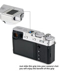 Deluxe Metal Thumb Up Grip for Fuji X100V X100F X-E4 X-E3 Cameras shown mounted in hot shoe, emphasizing secure attachment