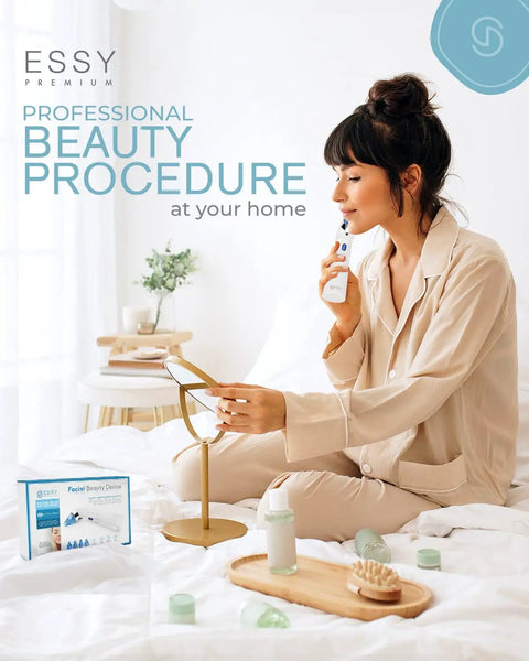 Woman using Blue Blackhead Remover Facial Cleanser Vacuum With Five Suction Levels sitting on bed with beauty products