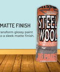 Extra Fine Steel Wool Pads 000 16 Pack For Ultra Smooth Finish Scratch Free Surface Prep Waterless Window Cleaning Polishing Finishing And Woodworking Abrasive packaging on wooden floor.