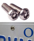 Tight Anti Theft License Plate Screws Keep Your Ride Locked Down Stainless Steel 1/4 Inch Bolts For Cars And Trucks showing two secure license plate screws.