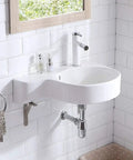 Slick Ceramic Wall Mounted Bathroom Sink With Deep Corner Basin And Standalone Pedestal Base, glossy white finish in modern bathroom setting.