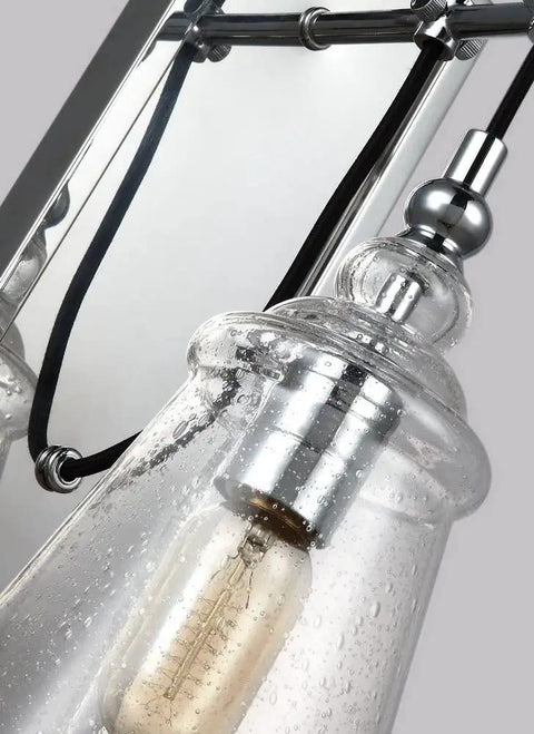 Close-up of glass fixture on Loras One Light Wall Sconce In Traditional Style With Weathered Iron Finish, 5.75 Inch Wide By 17 Inch