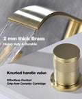 Brushed Gold Bathroom Sink Faucet Eight Inch Widespread With Two Handles Brass Waterfall Lavatory Vanity Faucet Overflow Pop Up Drain Assembly Drip Free Ceramic Cartridge showing brass knurled handle and waterfall flow.