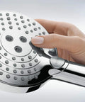 5-Inch Low Flow Handheld Shower Head With Three Spray Modes PowderRain Rain Whirl EcoRight Water-Saving Tech in hand view