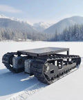 Heavy Duty Self Propelled Machinery Moving Dolly With Remote Control For Industrial Equipment Transport on snowy terrain.