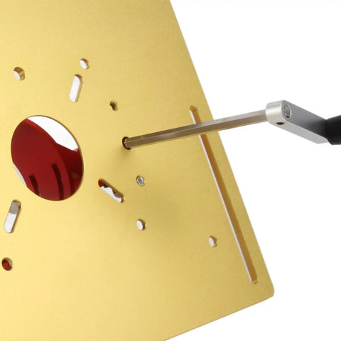 Heavy Duty Aluminum Router Lift For Top Shelf Woodworking Tables Featuring Smooth Manual Crank 0 To 47 Mm Height Adjustment and Boss Tier Clamping Base In Clean Gold Finish with a crank handle adjusting height.