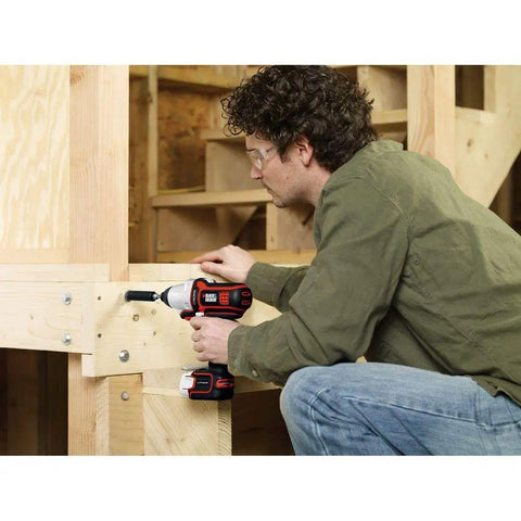 Man using Matrix Impact Driver Attachment Delivers Big Torque With No Kickback Ultra Compact For Tight Spaces Variable Speed