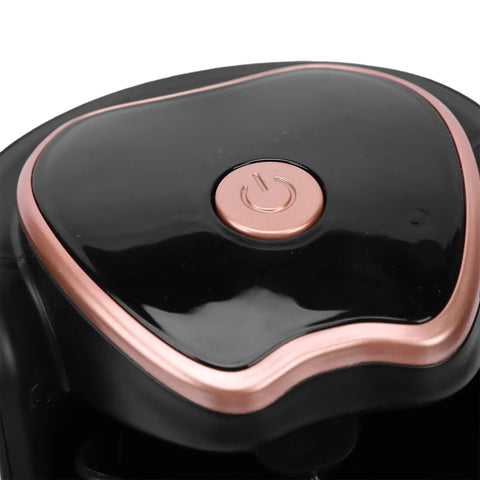 Close-up of black and copper compact Turkish Coffee Maker Portable Auto Brewer For Home Office Travel And Camping, Consistent Hot Brews Every Time