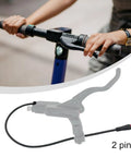 Person riding e-bike with Electric Bike Brake Sensor Cut Off Power Kit With 2 Pin Connector, 2A 2Y for safer stops.