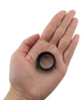 Heavy Pro Move Aluminum C To Cs Lens Adapter Extension Tube For Cctv Security Cameras Featuring Zero Fuss Threads and Hella Secure Spacer Ring held in a hand.