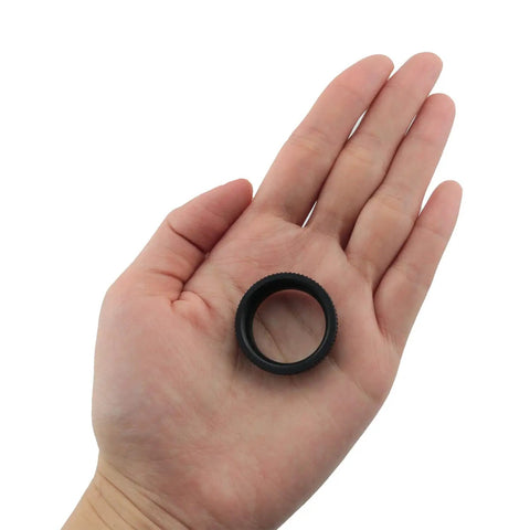 Heavy Pro Move Aluminum C To Cs Lens Adapter Extension Tube For Cctv Security Cameras Featuring Zero Fuss Threads and Hella Secure Spacer Ring held in a hand.
